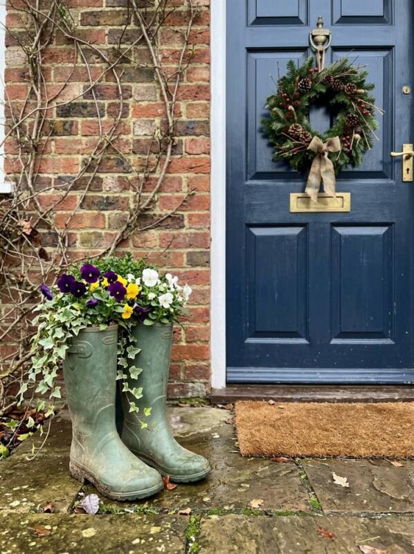 Wellies Planted with Winter Pansies – Christmas planter idea for UK homes