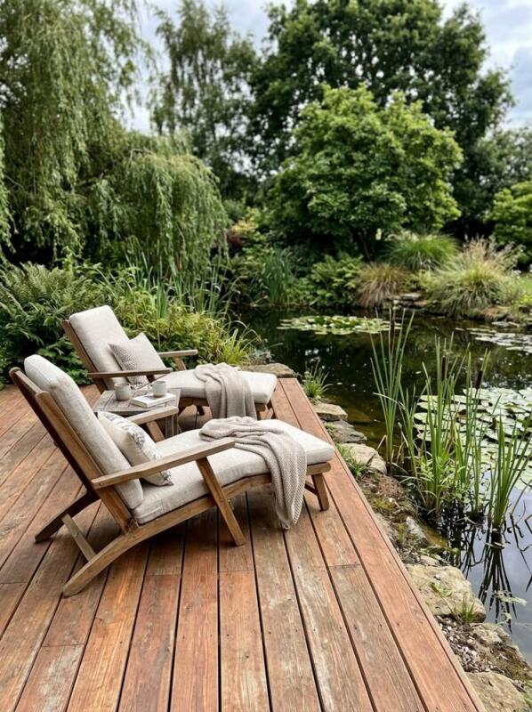 Cedar Decking beside a Pond – garden decking idea for UK gardens