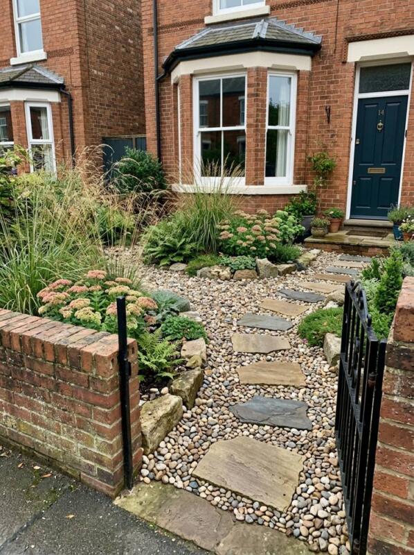 Pebbles, Stepping Stones and Ornamental Grasses – small front garden idea for UK terraced houses