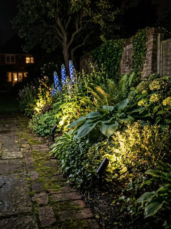 Spike Lights in a Flower Border – garden lighting idea for UK gardens