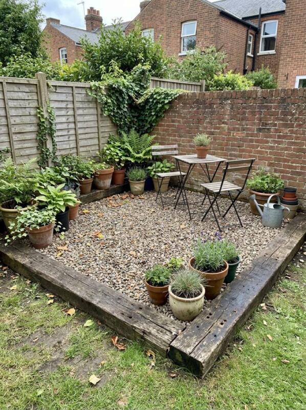 A Gravel Patio Edged with Sleepers – budget patio idea for UK gardens