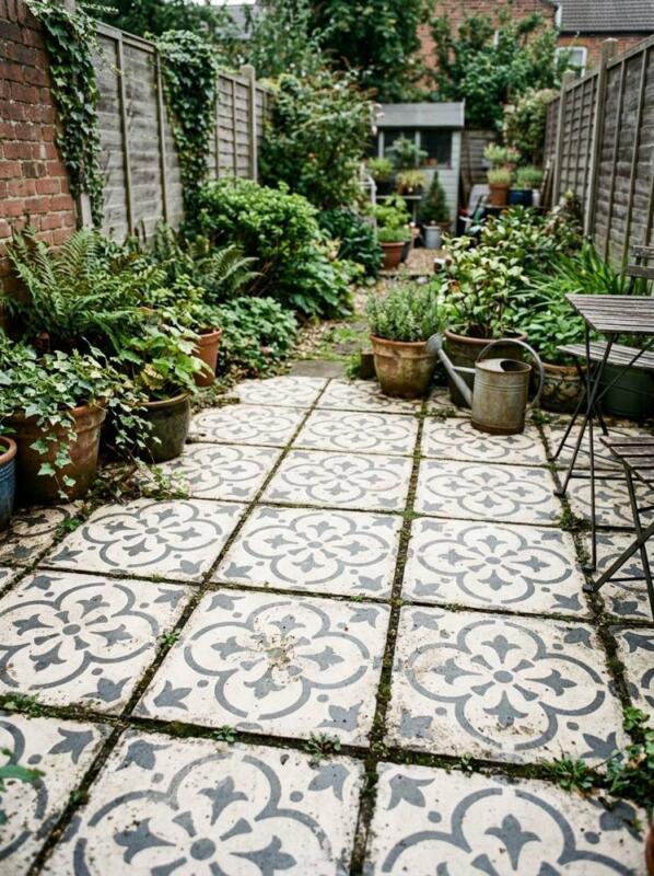 Old Slabs Painted with a Stencil Pattern – budget patio idea for UK gardens