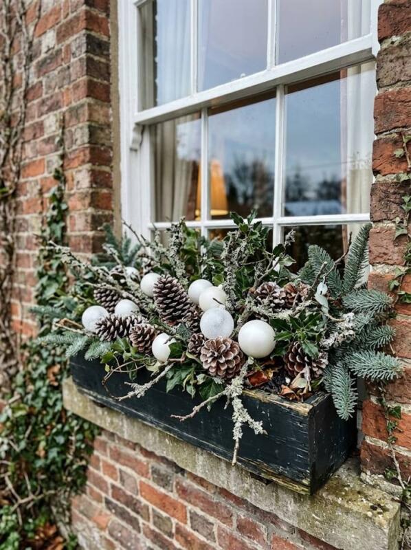 Frosted Pinecones and White Baubles – Christmas window box idea for UK homes