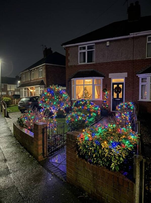Rainbow Lights on the Front Hedge – outdoor Christmas lights idea for UK gardens